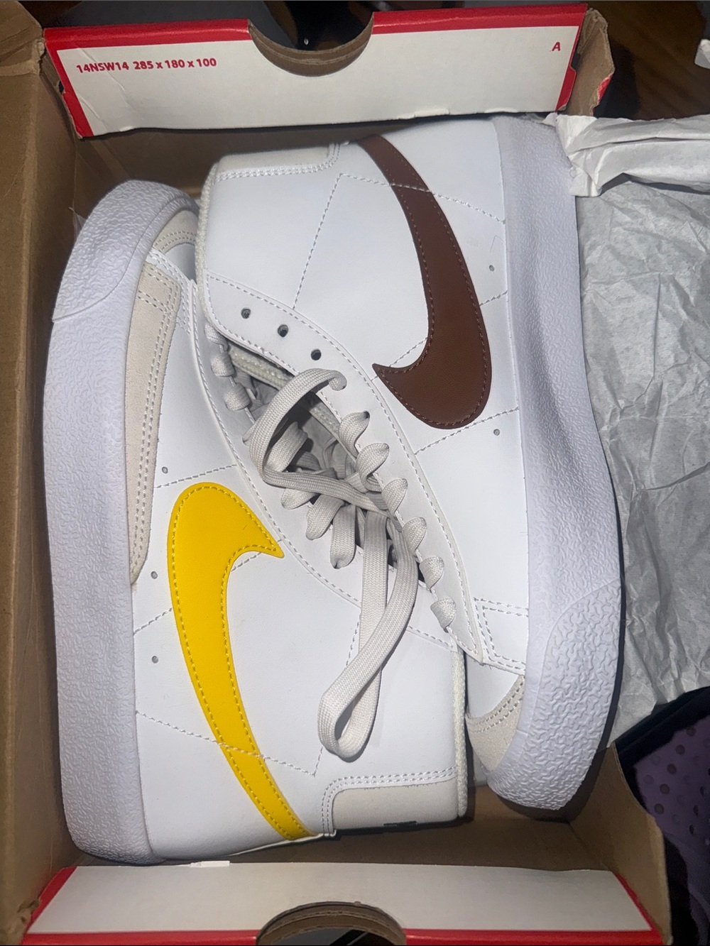Nike White Mid-Top Sneakers with Yellow & Brown Swooshes